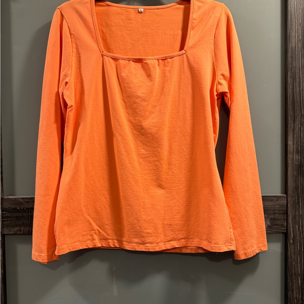 Boutique long sleeved square neck shirt. Orange in color, size XL.